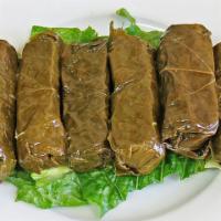 Dolma · 6 Grape Leaves Stuffed with Garbanzo Beans, Rice, Vegetables and Spices. (Vegetarian/Vegan) ...