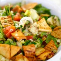 Fattoush Salad · Romaine Lettuce, Cucumbers, Tomatoes, Onions, Dried Mint, Toasted Pita, Mixed with Olive Oil...