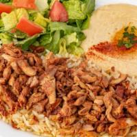 Chicken Shawerma Plate (Dinner) · Seasoned Chicken slowly grilled on our vertical grill. Served with Hummus, House Salad and R...