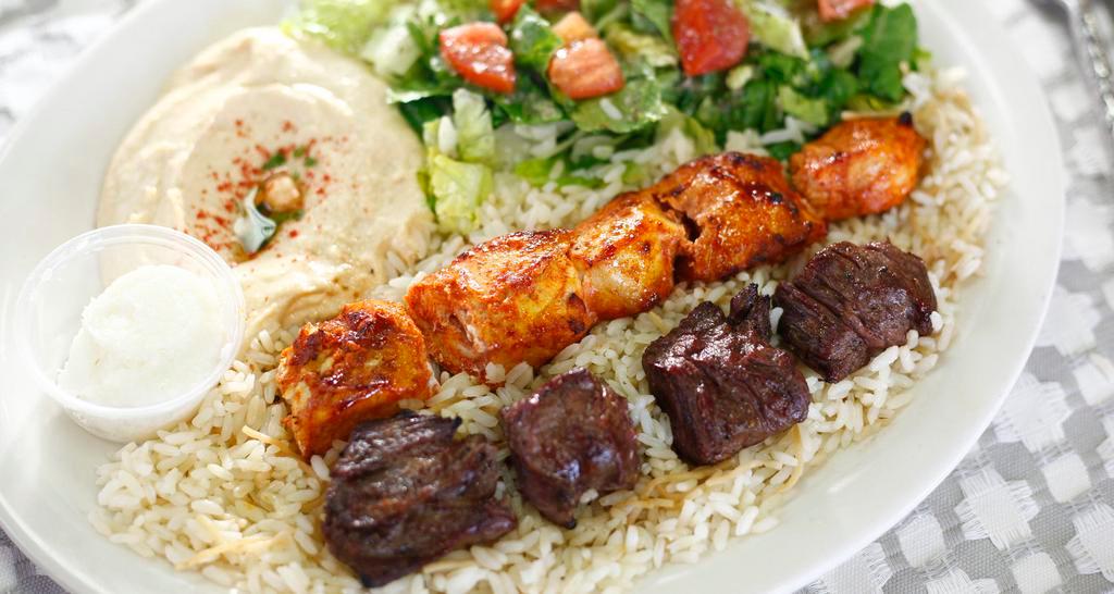Kabob Combo Plate (Dinner) · A Combination of Two Skewers of Beef, Chicken, or Kafta Kabobs. Served with Hummus, House Salad and Rice.
