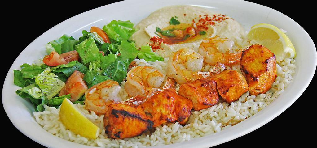 Shrimp Combo Kabob (Dinner) · One Skewer of Marinated Shrimp and One Skewer of Chicken Kabob grilled up to perfection. Served with Hummus, House Salad and Rice.