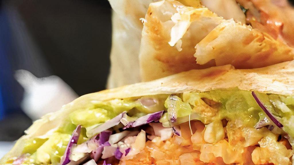 Shrimp Burrito · Grilled shrimp in warm flour tortilla filled with rice, lettuce, tomato, onion and cilantro mix, sour cream, cheese and choice of salsa (mild or hot).
