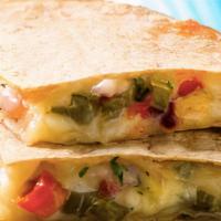 Quesadilla Nopales · Warm flour tortilla filled with cheese and with nopales side of sour cream and avocado salsa.