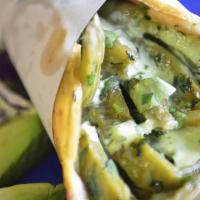 Burrito Nopales · Warm flour tortilla filled with nopales, beans, rice, lettuce, diced tomato, cheese, sour cr...