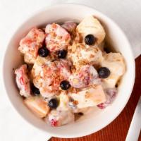Bionico · Fruit salad consisting of variety of fruits chopped up in small cube drenched with sweet cre...