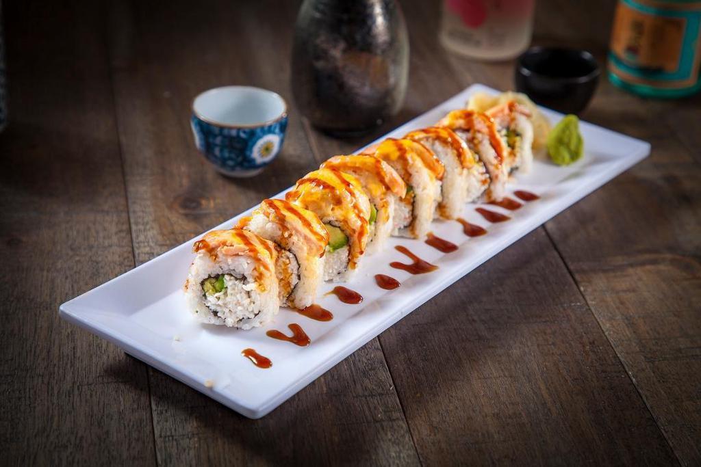 Baked Salmon Roll · IN: Imitation Crab, Avocado. OUT: Baked Salmon, Spicy Mayo, Eel Sauce
