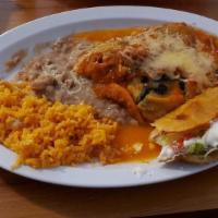 Chile Rellenos · Chili peppers stuffed with cheese. Served with rice and beans.