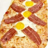 Breakfast Pizza · Turkey or pork bacon, eggs, mozzarella, marinara sauce.