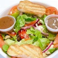 Greek Salad · Romaine lettuce, tomato, red onions, bell pepper, feta, Kalamata olives and cucumber served ...