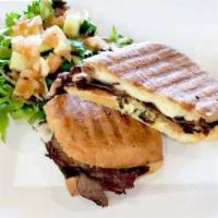 Philly Cheese Steak Panini · Grilled bell peppers, onions, mushrooms, American and Provolone cheese and mayo.