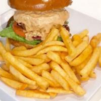 California Crave Burger · 100% Angus brisket patty, lettuce, tomato, grilled onions, homemade Thousand Island, choice ...