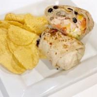 1/2 Lb Chicken Burrito · Black beans, Spanish rice, Cheddar cheese, guacamole, pico de gallo, fresh cilantro, sour cr...