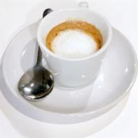 Macchiato · Two shots of espresso with foam, made with Lavazza.