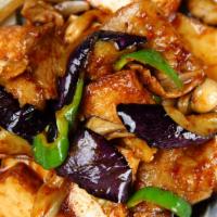 Eggplant With Tofu · Chinese eggplant with fried tofu and green and white onion in Szechuan sauce (hot or mild).