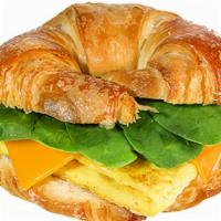 Croissant - 'Egg & Cheese' · JUST Egg, American 'cheese,' and spinach on a toasted croissant.