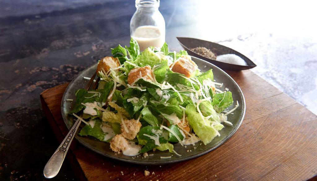 Caesar Salad · Crisp romaine, aged parmesan, croutons and Caesar dressing.