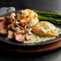 The Tri-Tip Prospector · Slow-roasted Tri-Tip and seared chicken smothered in a caramelized onion and mushroom bleu c...