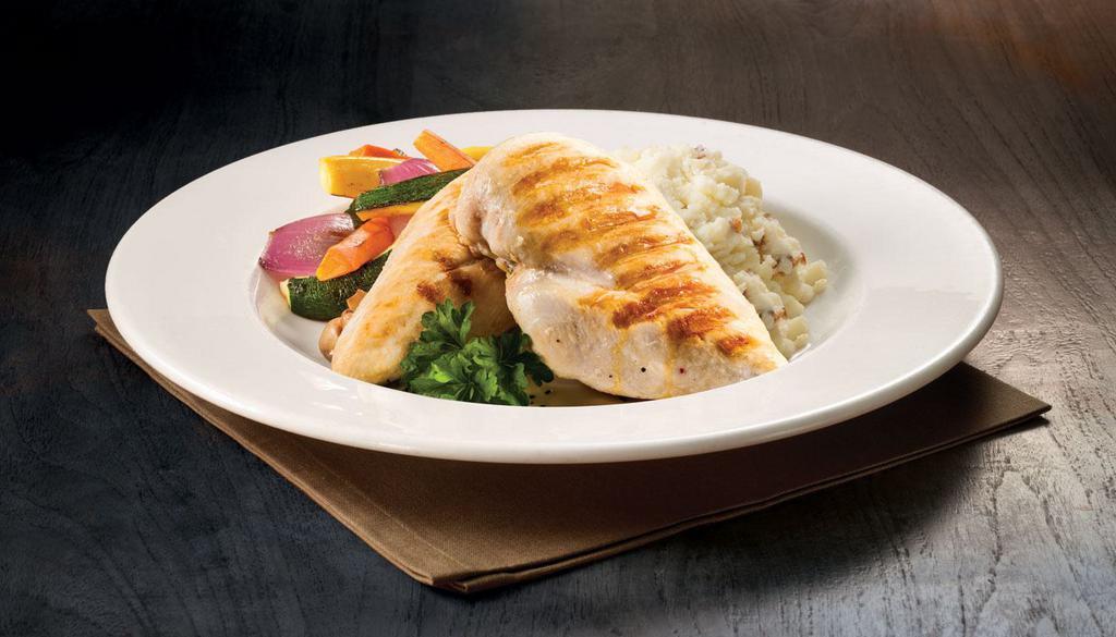 Fire Grilled Chicken  · Grilled chicken breast, mashed potatoes, roasted vegetables.