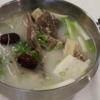 Kalbi Soup 갈비탕 · Short rib soup with glass noodle.  Comes with rice and banchan (side dishes).