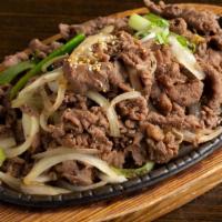 Bulgogi 불고기 · Marinated beef bulgogi. Comes with side dishes and bowl of soup.