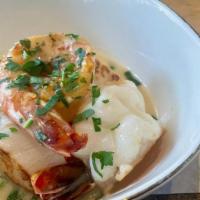 Shrimp & Scallops · Lightly sauteed in White Wine Sauce