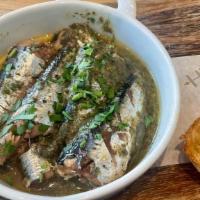 Warm Sardines · Lightly sauteed in Garlic Butter and Parsley