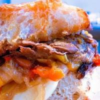 Scala · Braised short ribs, sauteed peppers, smoked mozzarella, caramelized onions