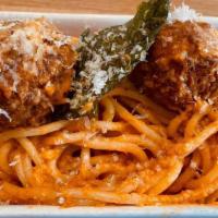 Spaghetti Pomodoro · Spaghetti with tangy tomato sauce, basil and Parmesan cheese. Optional jumbo meatballs