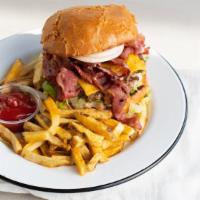 Royal Pastrami Burger · Served with royal sauce, tomato, lettuce, onions.