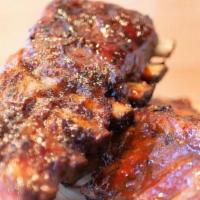 Baby Backs · Rubbed and smoked Tender Baby Back Ribs