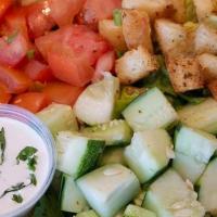 House Salad · Crisp lettuce, tomato, cucumber, croutons, buttermilk dressing