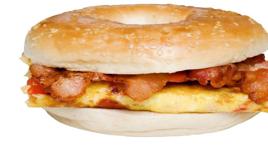 Bagel Sandwich · Two Fresh Caged Free Eggs,  Mayo, Choice of American, Cheddar, Pepper Jack or Swiss Cheese with your Choice of  Bacon,  Chorizo, Ham, Polish Sausage or Sausage Patty on a Freshly Baked Plain Bagel.