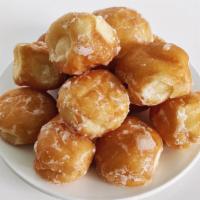 Dozen Donut Holes · Options include raised glazed donut holes or cake donut holes with sprinkles or cinnamon cru...