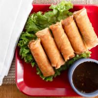 Best Egg Rolls In Town · Hand rolled with marinated pork, carrots, glass noodles, shitake mushrooms and onion, then f...