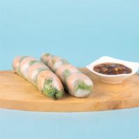 Shrimp Spring Rolls · Shrimp and vegetables in a rice paper roll with dipping sauce.