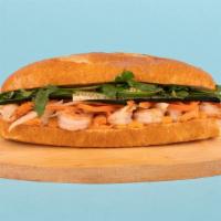 Shrimp Banh Mi · Grilled shrimp with cucumber, jalapeno, cilantro, pickled carrots and sriracha mayo on a fre...