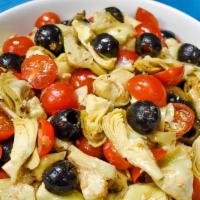 Artichoke Salad · Marinated artichoke hearts mixed with chopped olives and garlic
Scented citrus dressing.