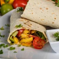 Chicken Shawarma Wrap · It comes with lettuce, tomato, and sauce.