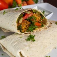 Falafel Wrap · It comes with lettuce, tomato, and sauce.