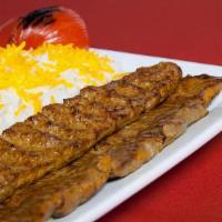 Soltani Kabob · A combination of beef barg and skewer of kobideh served with grilled tomato, Serrano pepper,...