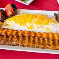 Kobideh Combination · Combination of one skewer of ground beef and skewer of ground chicken Kabob served with gril...