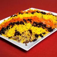 Adas Polo With Raisins & Carrots · Basmati rice mixed with lentil and topped with fried raisins and carrots.