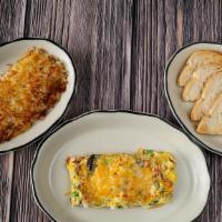 Veggie Omelette · Stuffed with mushrooms, tomatoes, bell peppers, onions and a sprinkling of cheddar cheese.