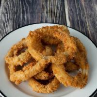 Onion Rings · A big stack of the best rings you have ever tasted, crispy on the outside, warm and moist on...