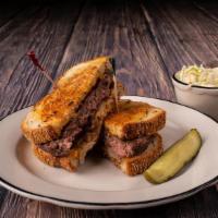 Manhattan Deli Pastrami Sandwich · A heaping pile of the best pastrami west of Manhattan served on jewish rye bread with spicy ...