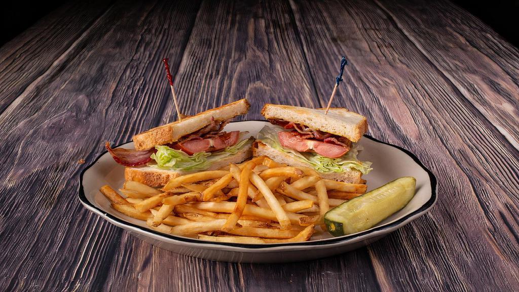 Blt Sandwich · Smoked bacon slices, lettuce and tomatoes.