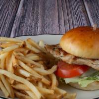 Grilled Chicken Sandwich · Tender filet of chicken breast on a hamburger bun with fresh lettuce and tomato.
