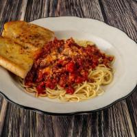Spaghetti Pasta & Meat Sauce · Rich meat sauce topping tender spaghetti noodles, sprinkled with parmesan cheese.