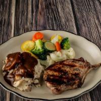Black Pepper Maple Glazed Pork Chop · Tender juicy eight unces center cut pork chop grilled to perfection and topped with a zesty ...