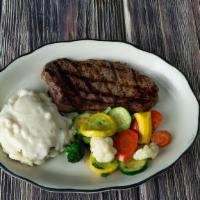 8 Oz. Top Sirloin Steak · USDA angus top sirloin cut seasoned with our special rub, herb butter and grilled to your ta...